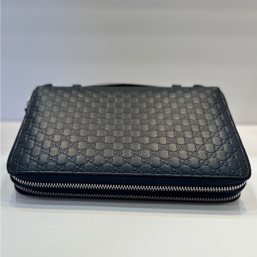 Gucci MicroGuccissima Leather Clutch